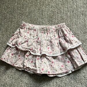 Phi skort. Decorative bow in back. Cotton. Made in Portugal - adjustable waist .